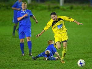 Clayton Johnson of Wellington is fouled by Kevin Buxton of Bridgnorth