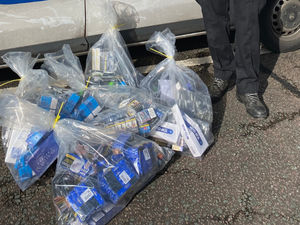 Supporting image for story: Under counters, a secret cupboard and inside an oven - £8.5k worth of illegal cigarettes and tobacco seized from Black Country shops