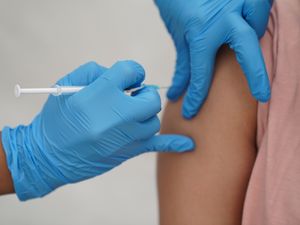 Supporting image for story: More than 600,000 people invited for booster as Covid-19 infections surge