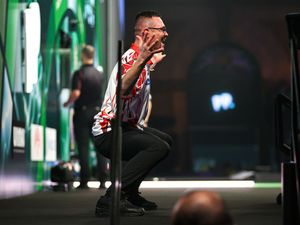 Supporting image for story: Damon Heta hits nine-dart finish but still exits World Championship