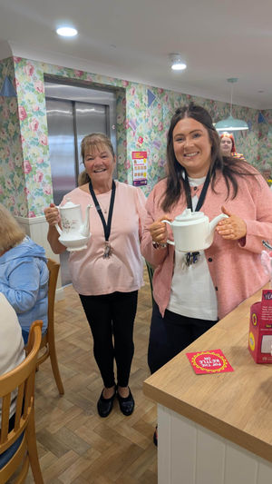 Colleagues at HC-One’s Littleton Lodge Care Home hosting Afternoon Tea event for Breast Cancer Now charity