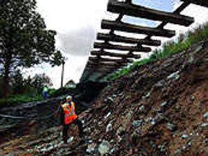 Supporting image for story: Minister visits flood-hit railway