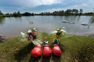 Boxing glove tributes were left at the scene today