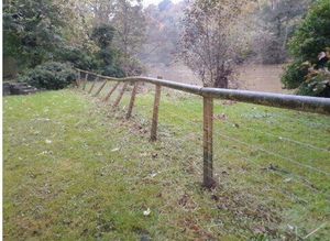 This river boundary fence was a trap for debris and was pushed out of place. Picture: Ludlow Town Council