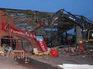 Supporting image for story: Major demolition starts on gutted shops