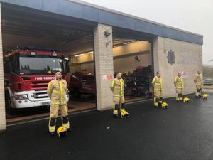 Firefighters stood outside the front of the town’s Innage Lane station for two minutes’ silence