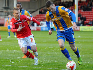 Supporting image for story: Micky Mellon laying out the welcome Mat