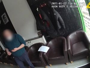Supporting image for story: Video shows customer arriving at barbers as police confront owner over breaches