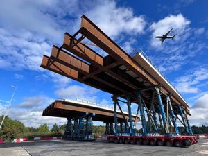 A plane takes off from Birmingham Airport, where drivers face delays due to the motorway closure