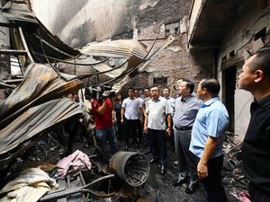 Supporting image for story: Apartment building fire in Hanoi kills at least 14