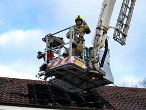 Supporting image for story: Flames rip through house roof in Christmas Eve cannabis blaze