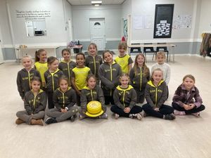 The current Girl guides unit, with a custom made cake.
