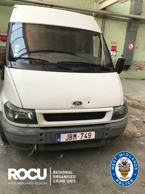 The van stopped by police with migrants inside