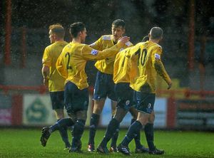 AFC Telford United players celebrate after Russell Benjamin of AFC Telford United scored a goal to make it 0-1