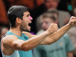 Carlos Alcaraz celebrates his title in Rotterdam