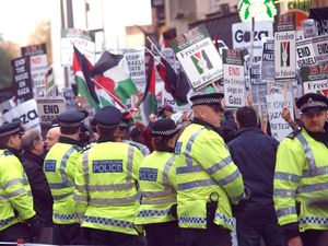 Supporting image for story: Vow to arrest protesters over intifada chant decried as political repression