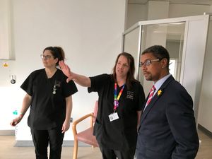 Fiona Osell from PTHB shows Vaughan Gething AM the new x-ray facilities at Llandrindod Wells Memorial Hospital.