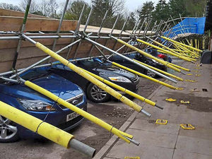 Supporting image for story: Strong wind brings scaffolding down on cars near Shropshire border