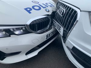 Damage to the stolen Audi Q3 and the police car