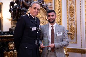 Hasan Hussain (right) receiving his award