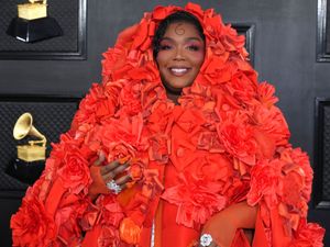 Supporting image for story: Lizzo dazzles with Dolce and Gabbana dress on Grammys red carpet