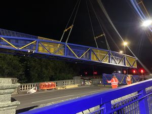 The Meole footbridge - and its blue and amber paint job - was lifted into place over the weekend.