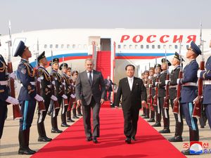 The Russian official arrives on the red carpet