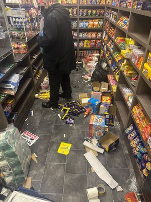 Empty shelves and damaged goods on the floor 