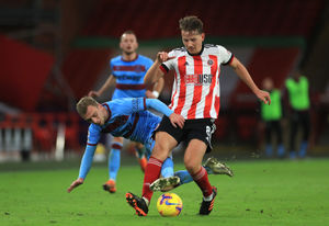 West Ham United's Jarrod Bowen (left) and Sheffield United's Sander Berge