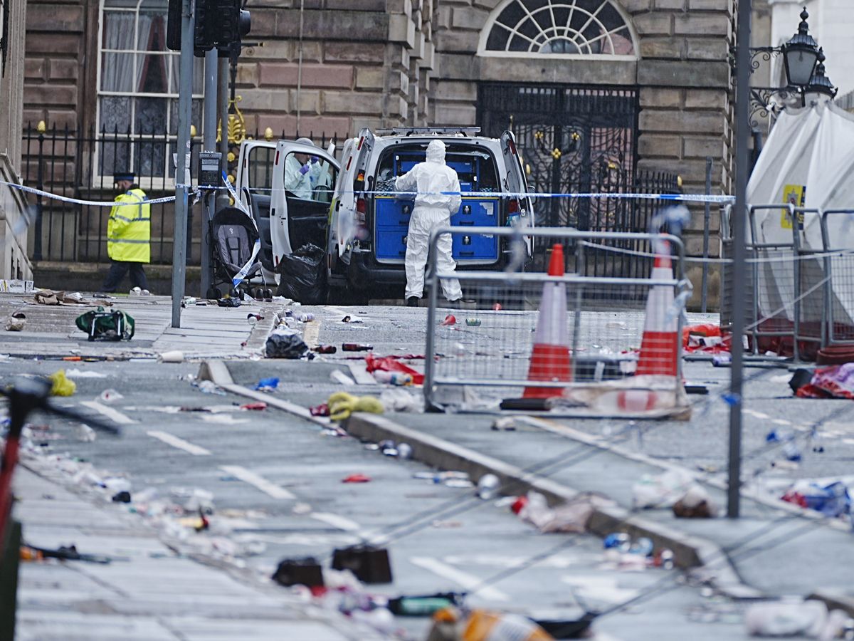 ‘Big question’ over how car was on road before parade incident, mayor says