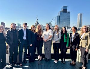Members of the FBC Manby Bowdler Birmingham team celebrate on the terrace after the move to the new offices at 5 St Philips Place
