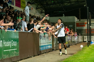 Jordan Cranston celebrates with the fans at the SEAH Stadium after the play-off semi-final victory over Halesowen (Picture: Kieren Griffin Photography)
