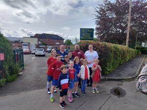 Supporting image for story: Nurses talk to children in primary school to mark International Nurses Day