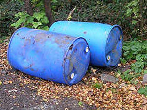 Supporting image for story: Drums of acid dumped in lane