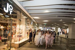 The wedding party make their way up to Grand Central after the ceremony. Picture by Incircles Photography 