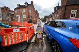 Lucy Shrank with the pushchair demonstrates how hazardous it can be anyway, even without the increase in traffic in Town Walls