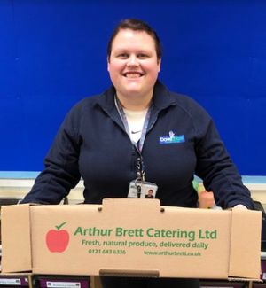 Dovecotes Primary School Year 3 and 4 teacher Alex Reeves with some of the food which the school has distributed