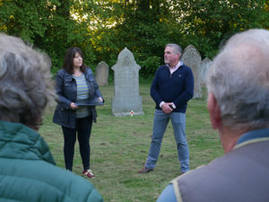 Chairman of Kington Chamber of Trade Emma Hancocks and veteran Brian MacKenzie at the service at Kington Cemetery on VE Day. Image: Andy Compton