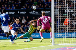 Charlie Taylor drops under pressure in the Ipswich box (Photo by Adam Fradgley/West Bromwich Albion FC via Getty Images)