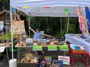 Youngest volunteer Kathryn on the Bracken Trust shop stall
