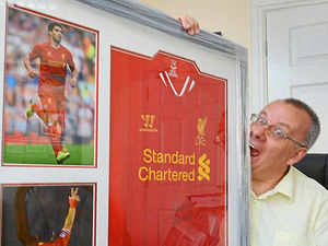 Supporting image for story: Fans chews to ignore charity Luis Suarez shirts