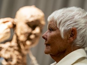 Supporting image for story: Sculptor produces bust of Dame Judi Dench in front of audience for charity