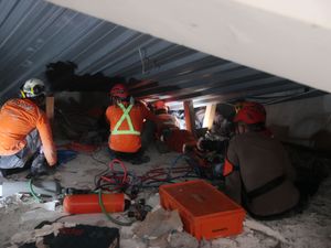 Supporting image for story: Rescuers search for survivors after school building collapses in Indonesia