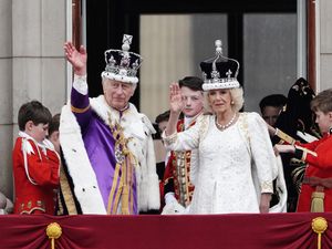 Supporting image for story: Buckingham Palace balcony appearance serves as poignant finale to memorable day