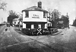 Supporting image for story: 'Thank you all who do their best for town' - Your Letters and a picture of a historic toll house from 1930, eventually destroyed to a pile of rubble by a careless driver