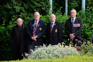 Reverend Andrew Tweed with veterans and Royal British Legion members at the Llandrindod Wells service