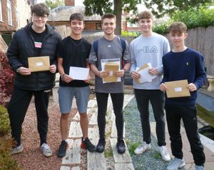 Students with their GCSE results at Haberdashers' Adams in Newport