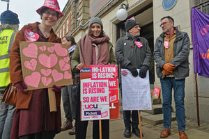 The picket line had a Valentine's Day theme, with love hearts and messages