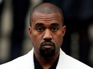 Supporting image for story: Kanye West scores chart success with long-awaited album Donda