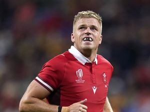 Gareth Anscombe looks up to the sky while playing for Wales